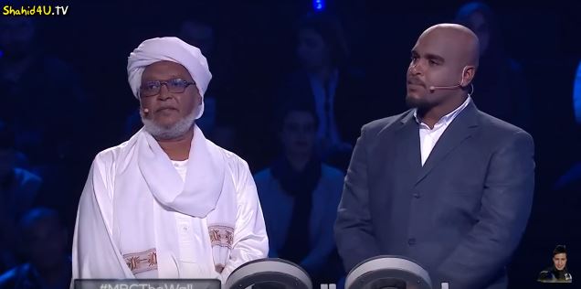 سوداني وابنه في برنامج الجدار